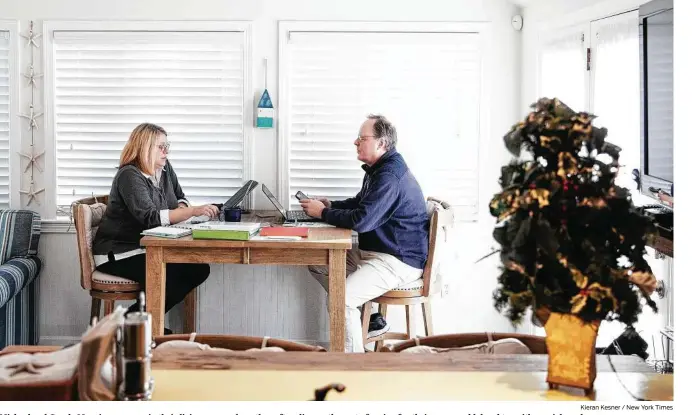  ?? Kieran Kesner / New York Times ?? Michael and Carole Maguire converse in their living room, where they often discuss the cost of caring for their 19-year-old daughter with special needs.