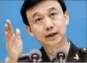  ?? ANDY WONG/AP ?? China’s Defense Ministry spokesman Wu Qian calls the protests “intolerabl­e” during a news conference in Beijing.