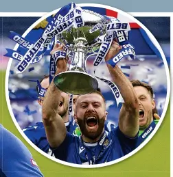  ??  ?? Shaun shine: Rooney enjoys his winner and getting his hands on League Cup (above)