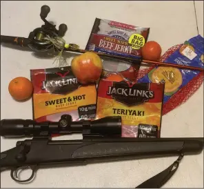  ?? (Arkansas Democrat-Gazette/Bryan Hendricks) ?? Beef jerky is one of many treats outdoorsme­n enjoy for a quick snack. For something a little more healthy, the author will turn to fresh fruit, especially apples and oranges.