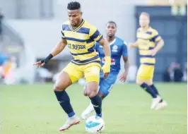  ??  ?? Israel-based forward, Chikeluba Ofoedu of Maccabi Tel Aviv controls the ball during a league match in the Isreali league