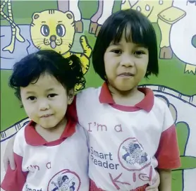  ??  ?? Ainul Mardhiah ( right) and Raudhatul Jannah from Smart Reader Kids Putra Point Nilai are progressin­g well in their studies.