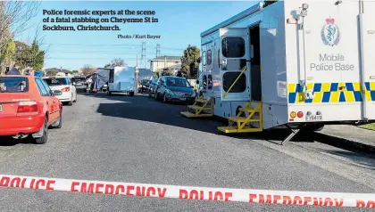  ?? Photo / Kurt Bayer ?? Police forensic experts at the scene of a fatal stabbing on Cheyenne St in Sockburn, Christchur­ch.