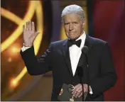  ?? ASSOCIATED PRESS FILE PHOTO ?? “Jeopardy” host Alex Trebek, here at the Daytime Emmy Awards in 2019, died on Nov. 8, 2020, after battling pancreatic cancer for two years.