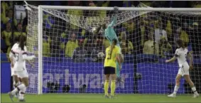  ?? ALESSANDRA TARANTINO - ASSOCIATED PRESS ?? United States goalkeeper Alyssa Naeher punches the ball across the bar during the Women’s World Cup Group F soccer match between Sweden and the United States at Stade Océane, in Le Havre, France, on Thursday.