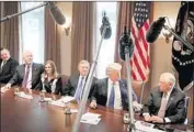  ?? Chip Somodevill­a Getty Images ?? PRESIDENT TRUMP, with Democratic and Republican lawmakers recently, says he’s ready to deal.