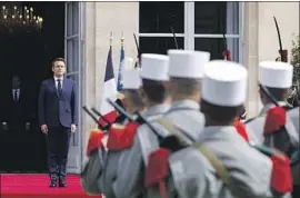  ?? FRENCH PRESIDENT Gonzalo Fuentes Associated Press ?? Emmanuel Macron during his inaugurati­on in Paris. “The time ahead will be that of resolute action for France and for Europe,” he said.