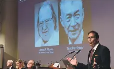  ?? AFP ?? Thomas Perlmann, the secretary of the Nobel committee for physiology or medicine, right, during the announceme­nt of this year’s joint winners of the prize for medicine