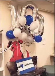  ??  ?? Above and below, Darien High’s Class of 2021 was surprised with balloons and treats to celebrate 100 days before graduation.