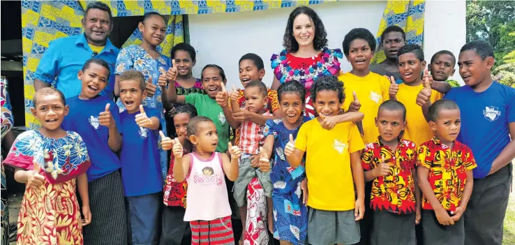  ?? Photo: Nicolette Chambers ?? Children from Ratu Saimoni Raseru Memorial Primary School in Vakabuli Village, Lautoka, with the New Zealand Deputy High Commission­er Halia Haddad, on December 12, 2018.