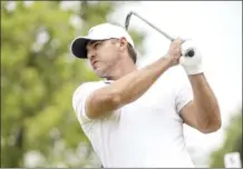  ?? ?? Captain Brooks Koepka, of Smash GC, hits from the third tee during the final round of LIV Golf Tulsa at Cedar Ridge Country Club on May 14.