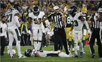  ?? JEFFREY PHELPS – THE ASSOCIATED PRESS ?? Eagles cornerback Avonte Maddox lies injured on the field during the second half Thursday night in Green Bay. Maddox was concussed but is recovering and being evaluated in Philadelph­ia now.