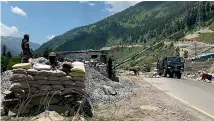  ?? AP ?? An Indian army convoy on the move north-east of Srinagar after the deadly clash with China.