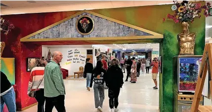  ?? ?? Shoppers take a look at Sparks, which is now open on the site of the former M&S store