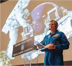  ?? KAYLE NEIS ?? Former Canadian astronaut Dave Williams speaks during Spectrum, a science exposition hosted by the University of Saskatchew­an.