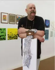  ??  ?? Artist Wendland, the curator of an exhibition on cloths that took place in Europe’s first tea cloth factory. — dpa