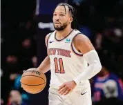  ?? Jacob Kupferman/Associated Press ?? New York Knicks guard Jalen Brunson brings the ball up court against the Charlotte Hornets during the second half on Monday in Charlotte, N.C.