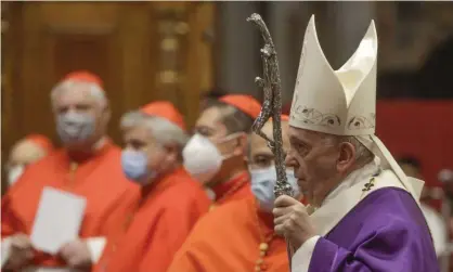  ?? Photograph: Gregorio Borgia/AP ?? Pope Francis holds his pastoral staff as he arrives to celebrate mass at St Peter’s Basilica inNovember.