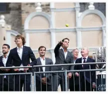  ??  ?? Spain's tennis player Rafael Nadal, center, throws a ball to fans during a welcome ceremony of the Laver Cup at the Old Town square in Prague, Czech Republic, Wednesday. (AP)