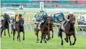  ?? RACE IMAGES SOUTH ?? Legarto, at right, leaves the 1000 Guineas field in her wake at Riccarton yesterday.