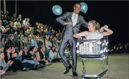  ??  ?? Benton Erasmus and Rachel Hill had the crowd in hysterics when they arrived for the Hillcrest High matric dance in their own version of luxury transport..