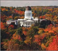  ?? ?? The State House is surrounded by fall foliage Oct. 23, 2017, in Augusta, Maine. Recent leaf-peeping seasons have been disrupted by weather conditions in New England, New York and elsewhere. (File Photo/ap/robert F. Bukaty)