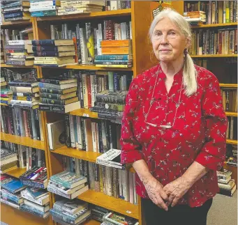  ?? ERROL MCGIHON ?? Jayne Wyatt, co-owner of Book Bazaar, is upset about Bank Street closing every weekend.