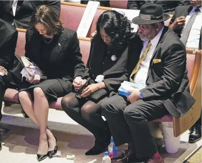  ?? ANDREW NELLES PHOTOS/THE TENNESSEAN VIA AP, POOL ?? ABOVE: Vice President Kamala Harris (left) holds the hand of RowVaughn Wells as she is held by her husband Rodney Wells during the funeral service for her son Tyre Nichols at Mississipp­i Boulevard Christian Church in Memphis, Tenn., on Wednesday. RIGHT: The Rev. Al Sharpton introduces the family of Tyre Nichols.