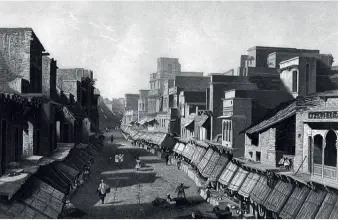  ??  ?? ‘Principal Street at Agra, 1858-62’, salt print from a waxed paper negative by John Murray