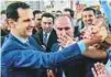 ??  ?? Al Assad in rare appearance outside capital