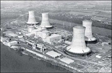  ?? ASSOCIATED PRESS 1979 ?? Three Mile Island nuclear power plant, near Harrisburg, Pa., is shown in March 1979, when equipment failure and operator errors led to a partial core meltdown of Unit 2, leading to days of fear and prompting 144,000 people to flee their homes.