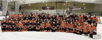  ?? KEENE WOLVERINES PHOTO ?? Members of the Keene Wolverines teams gathered at Keene Wolverines Day 2024 for a little four-on-four and a celebratio­n of girls hockey.