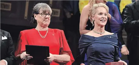  ?? HENRIK MONTGOMERY THE ASSOCIATED PRESS ?? Physics 2018 Nobel laureate Donna Strickland, left, and Chemistry 2018 Nobel laureate Frances H. Arnold during the Nobel Prize award ceremony.