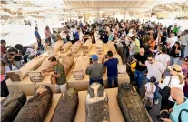  ?? — ap ?? Painted coffins with well-preserved mummies INSIDE ARE DISPLAYED At A MAKESHIFT EXHIBIT In SAQQARA on Monday.