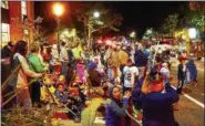  ?? DIGITAL FIRST MEDIA — FILE PHOTO ?? Good weather can have spectators lined up rows deep along High Street to view the annual Pottstown Halloween Parade Tuesday. the rain date is Thursday.