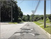  ??  ?? In Winsted, Spencer Street between Losaw Road and Hinsdale Avenue is included in a newly announced resurfacin­g plan developed by the Department of Public Works.