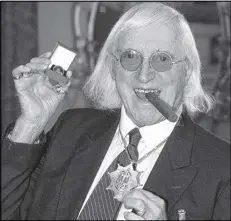  ?? ASSOCIATED PRESS 2008 ?? Allegation­s that BBC children’s TV host Jimmy Savile abused hundreds of young people have prompted national debate and led scores of adults to contact authoritie­s about other, unrelated cases.