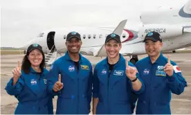  ?? Photograph: Nasa/James Blair/PA ?? Nasa astronauts Shannon Walker, Victor Glover and Michael Hopkins, along with Soichi Noguchi of Japan, board a plane from Houston, Texas, en route to the Kennedy Space Center in Florida.