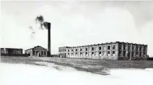  ??  ?? In 1891, a single smokestack puffed smoke from a coal furnace that provided power for Kodak’s four-building production complex.