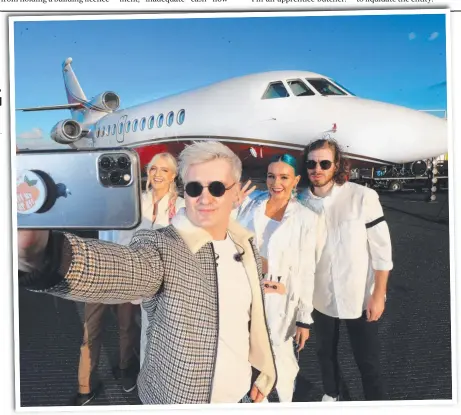  ?? Picture: SCOTT POWICK ?? Brisbane band Sheppard take a selfie before playing their Gold Coast Airport runway concert.