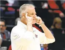  ?? DENIS POROY FOR THE U-T ?? San Diego State head coach Brian Dutcher says the Aztecs “have to play well to win. We can’t play poorly and win a game.”