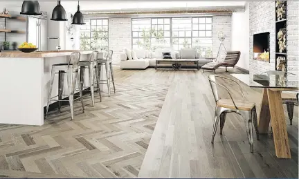  ?? LAUZON MONTREAL ?? The same wood is configured to define room areas in an open concept home. Hickory Sabbia Collection.