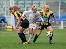  ?? PHOTOSPORT ?? Glenfield defender Hannah Mackay-Wright, right, looks to close down Eastern Suburbs’ Jacqui Hand.