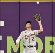  ?? TONY DEJAK — THE ASSOCIATED PRESS ?? Detroit Tigers’ JaCoby Jones catches a fly ball hit by Cleveland Indians’ Andres Gimenez in the fourth inning in Friday’s game in Cleveland.