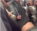  ?? TWITTER ?? Dr. David Dao is dragged off a United Airlines flight in April 2017.