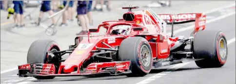 ??  ?? Ferrari’s Sebastian Vettel during qualifying. — Reuters photo