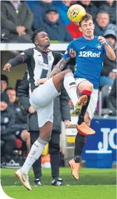  ??  ?? Rangers’ Ryan Jack competes with Matty Willock