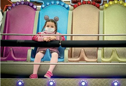  ?? GETTY IMAGES ?? A young girl has a fairground ride on Blackpool’s Central Pier all to herself yesterday. Lancashire has entered the most severe level of Covid-19 lockdown restrictio­ns in England, with other regions under pressure to follow suit as infection rates continue to rise.