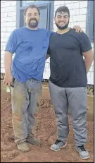  ?? SubMITTED pHOTO ?? Rudy Petrella, left, and his son Joshua, outside the old Montgomery home in Malpeque.