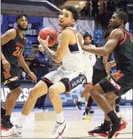  ?? Gregory Shamus / Getty Images ?? UConn’s James Bouknight looks to shoot against Maryland’s Darryl Morsell during the second half of Saturday’s NCAA Tournament game in West Lafayette, Ind.